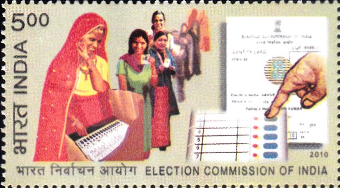 Women with Electronic Voting Machine (EVM) and Voter Card